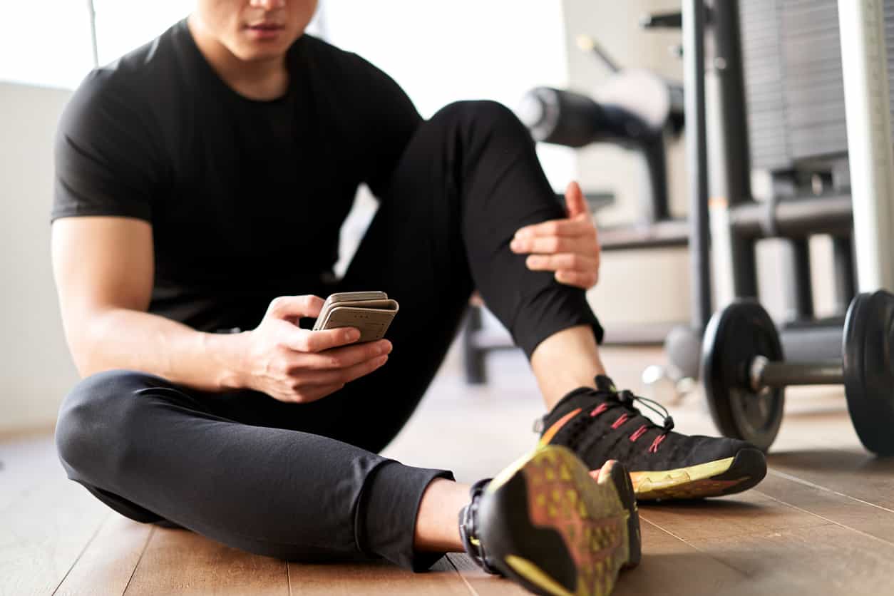 A person working out with weights, showing the physical changes after consistent exercise over a year.
